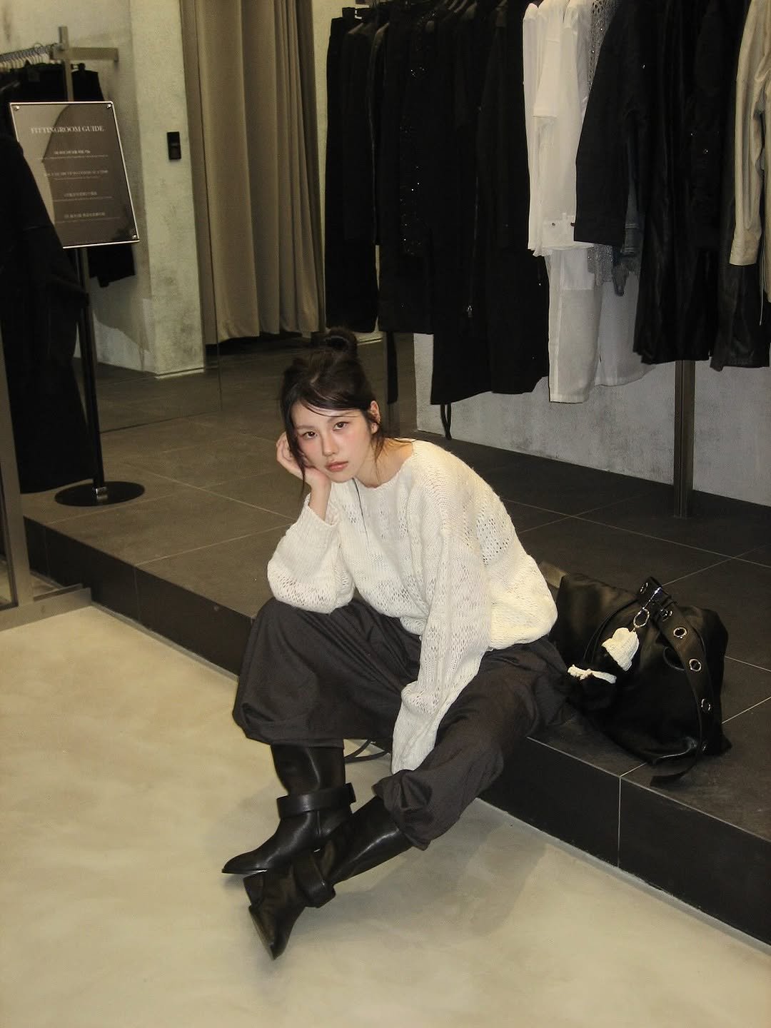 Photo shared by 윤비누 on September 26, 2025 tagging @treemingbird_official. May be an image of overcoat, mannequin and boots.