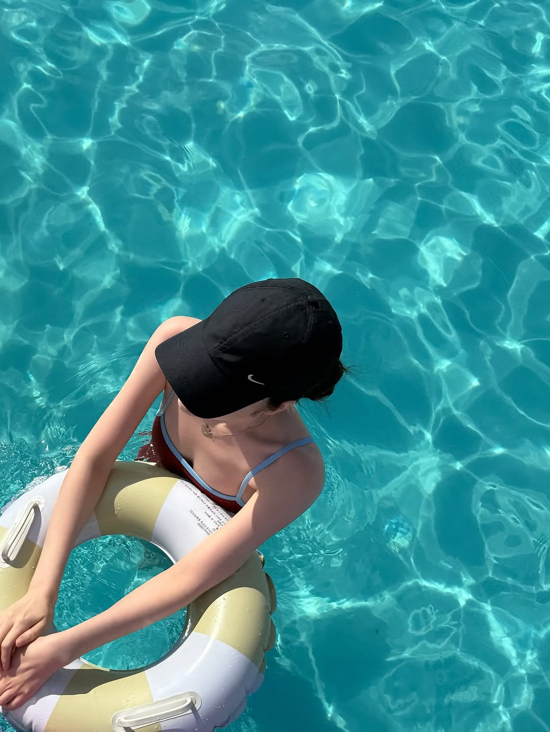Photo by xöoos 수스 on August 26, 2025. May be an image of 1 person, swimming, raft, beach ball, pool and text.