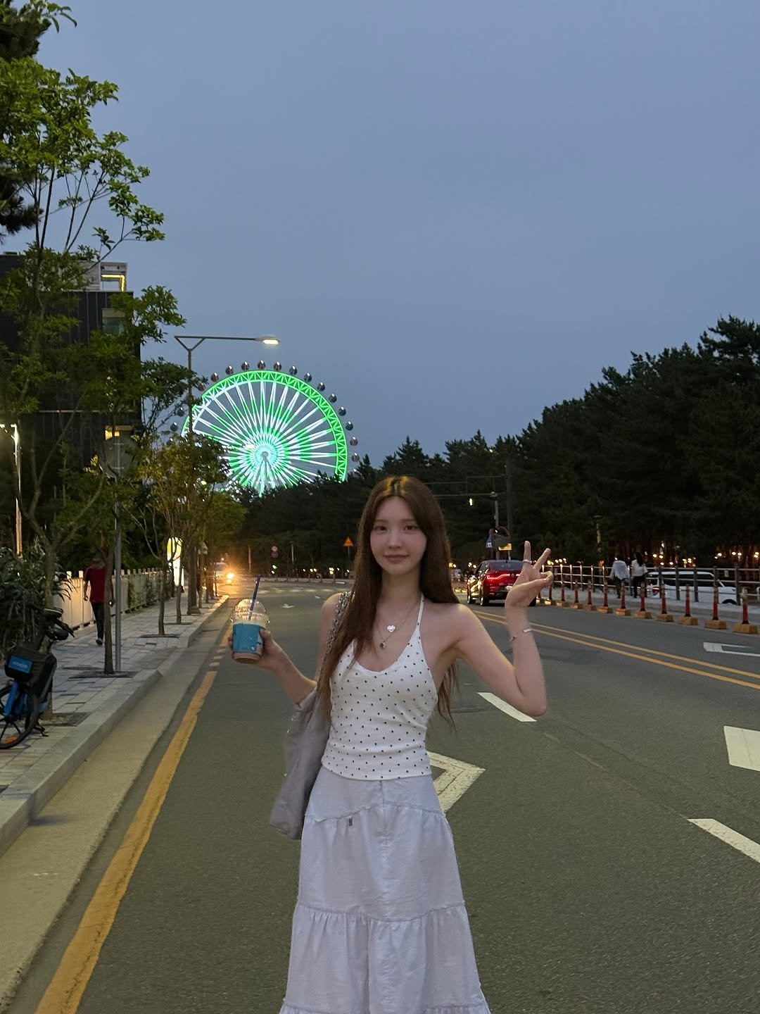 Photo by xöoos 수스 on July 14, 2025. May be an image of 2 people, street, Tokyo Tower and text.