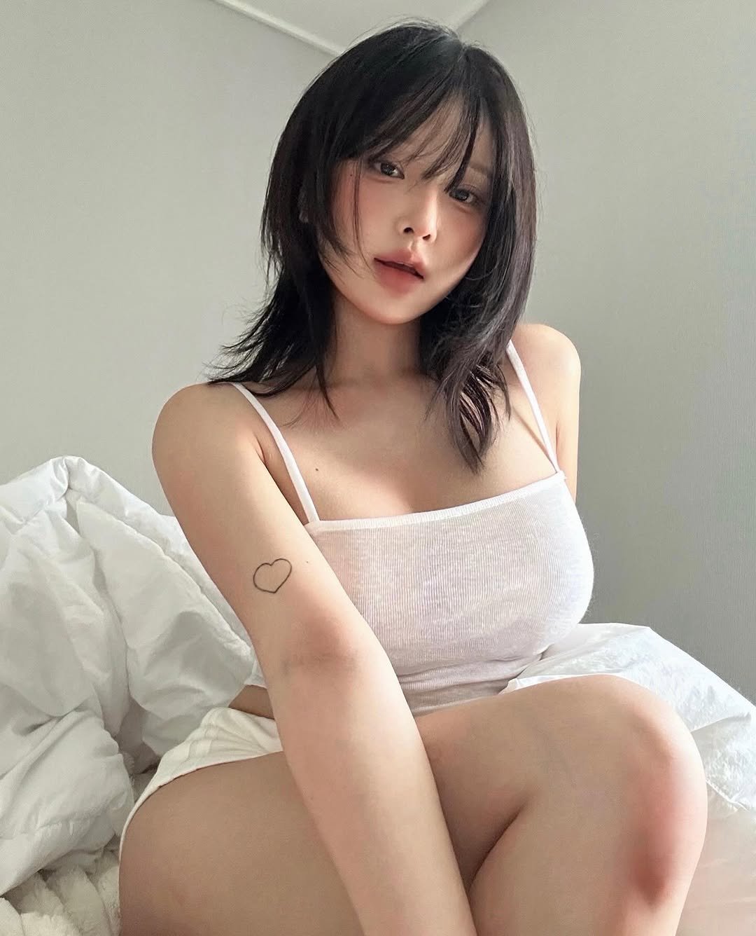 Photo by 유유 on July 07, 2025. May be an image of one or more people, hair, sleepwear, slip and chemise.