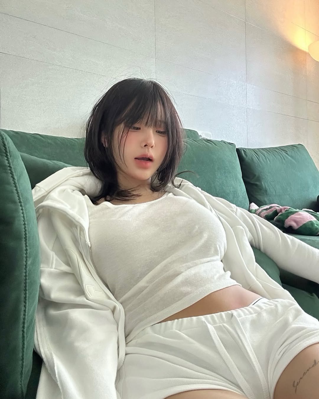 Photo by 유유 on July 12, 2025. May be an image of one or more people, hair, sleepwear, bath robe and top.