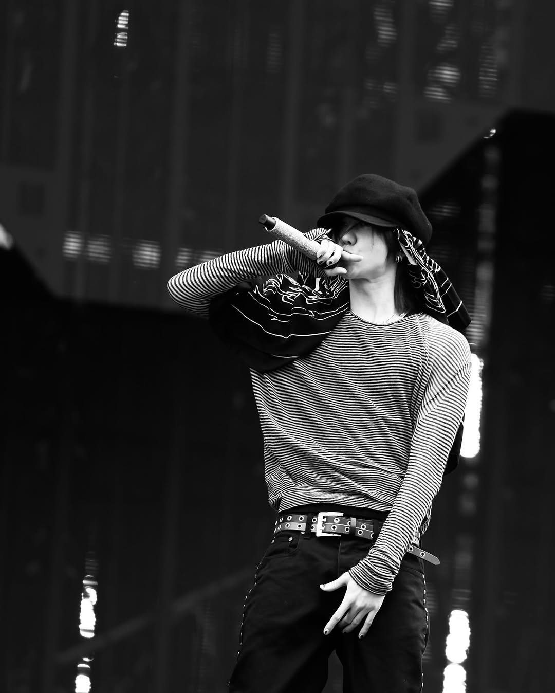 Photo by SEVENTEEN The8 on September 17, 2025. May be a black-and-white image of one or more people, bangs, top, bolo tie and concert.