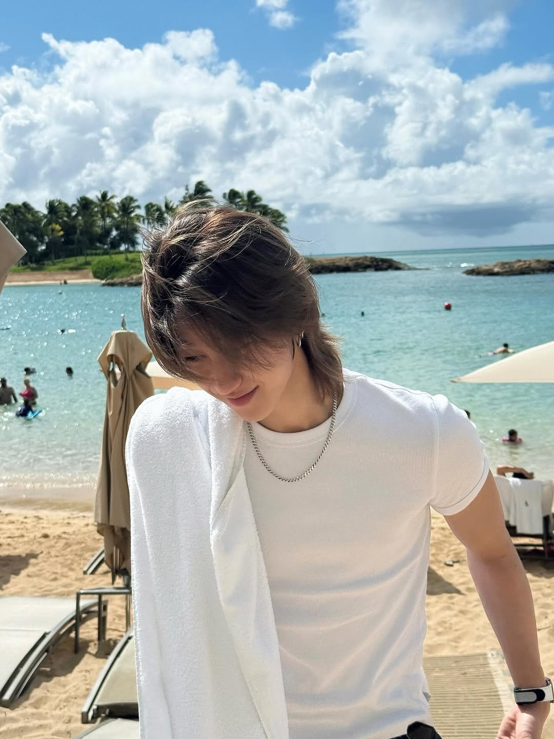 Photo by SEVENTEEN The8 on November 05, 2025. May be an image of one or more people, hair, beach, ocean and text.