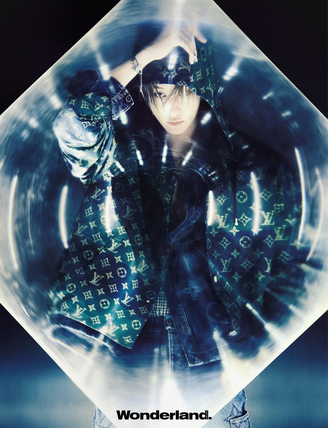 Photo shared by SEVENTEEN The8 on October 27, 2025 tagging @wonderland, and @wonderland.china. May be an image of one or more people, bangs, parka, raincoat, bolo tie, poster, top and text that says 'Wonderland.'.