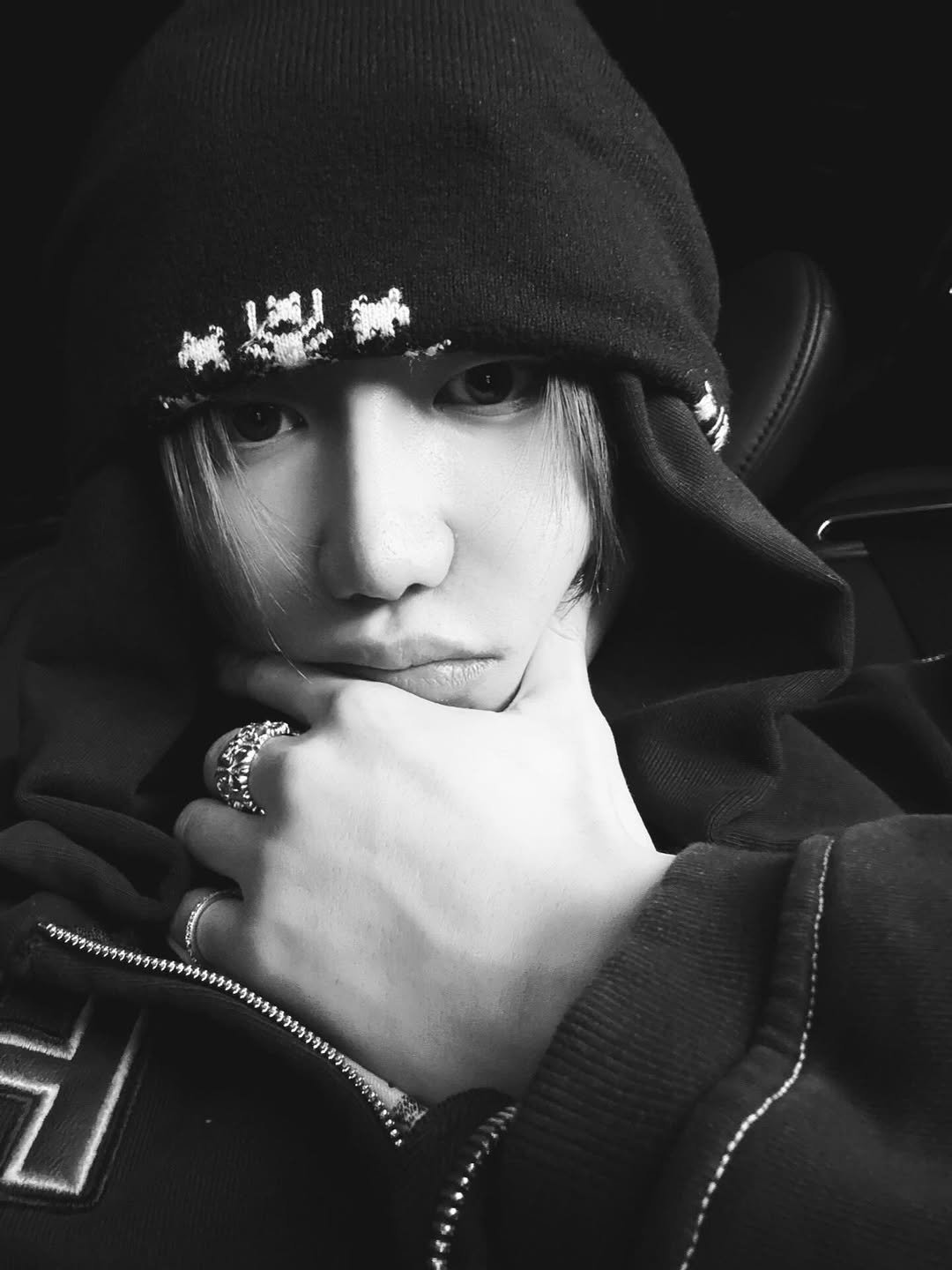 Photo by SEVENTEEN The8 on November 26, 2025. May be a black-and-white image of one or more people, bangs, hat, face mask, top and text.