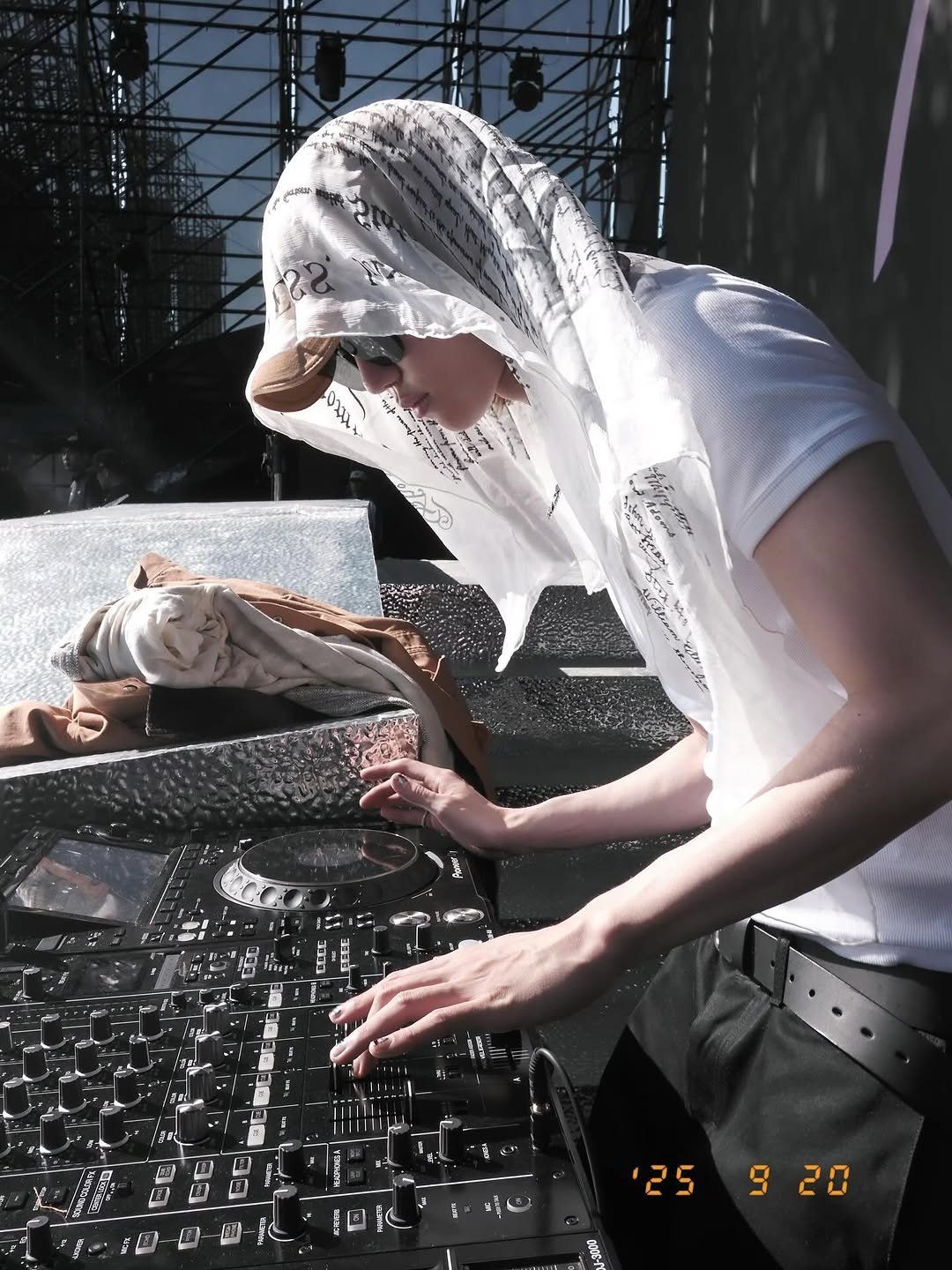 Photo by SEVENTEEN The8 on September 23, 2025. May be an image of computer keyboard, headscarf, face mask and cloak.