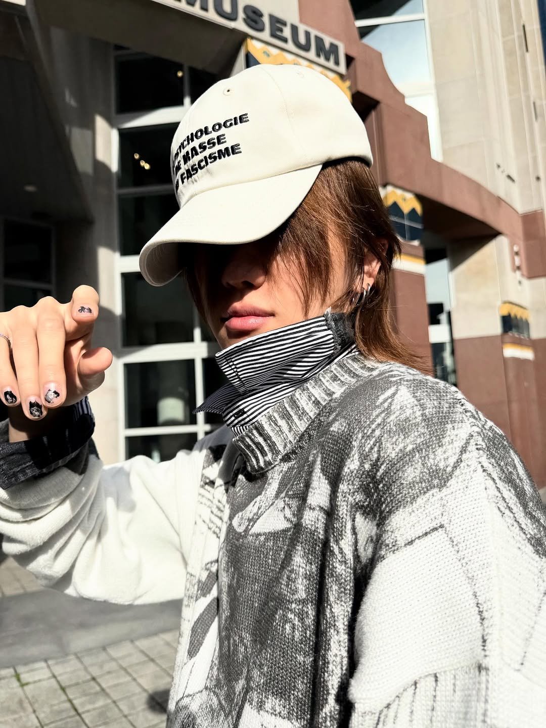 Photo by SEVENTEEN The8 on October 09, 2025. May be an image of hat, face mask, sweatshirt, turtleneck, headscarf, parka and text.