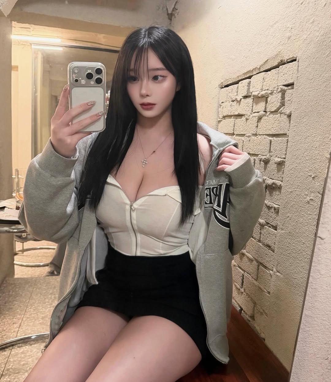 Photo shared by 이수빈 on February 08, 2026 tagging @xxaxix05. May be a selfie of one or more people, hair, top, miniskirt and text.