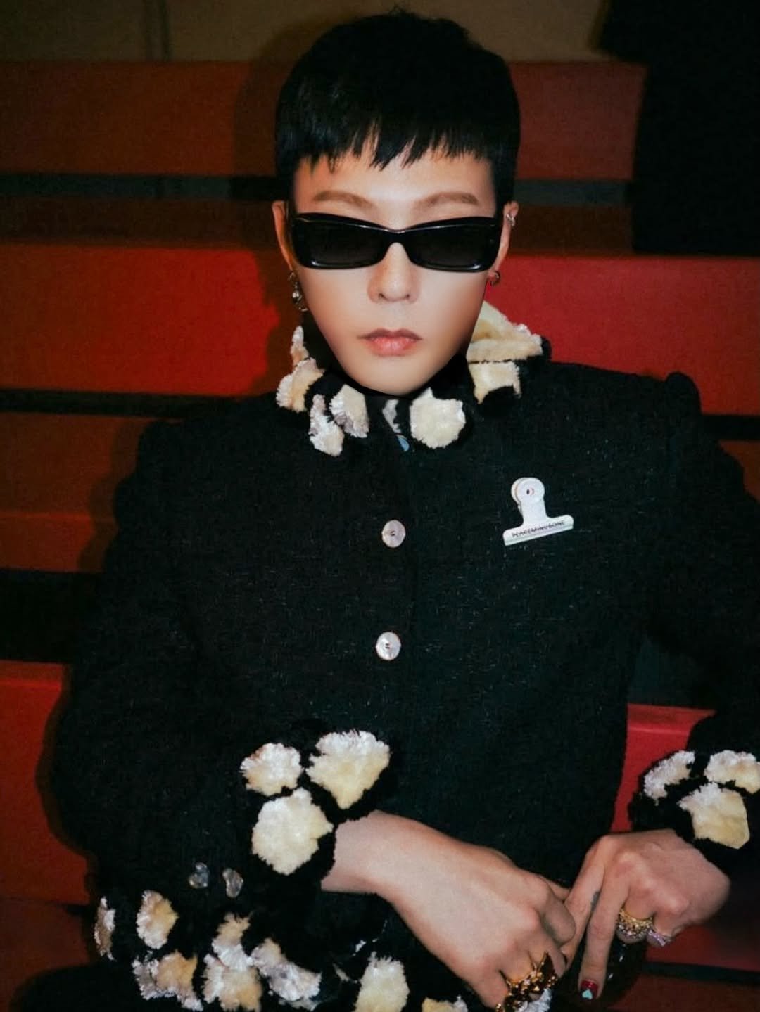 Photo by G-DRAGON on December 05, 2025. May be an image of one or more people, bangs, eyeglasses, top and bolo tie.