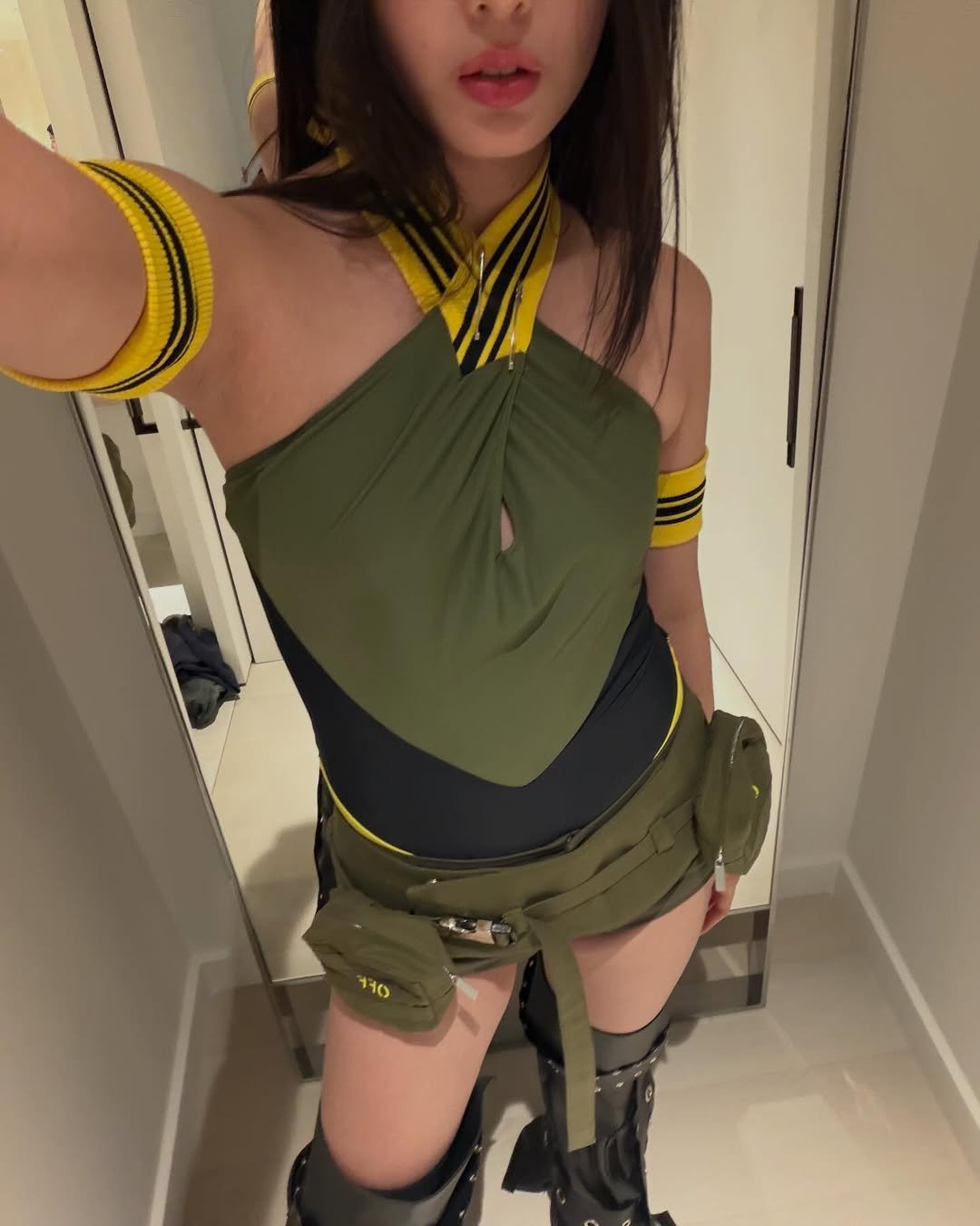 Photo shared by YOONCHAE JEUNG on February 05, 2026 tagging @off____white. May be an image of miniskirt, military uniform, costume and text.