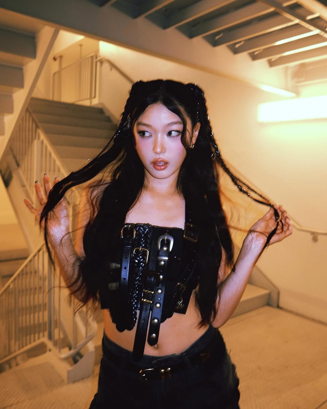 Photo shared by YOONCHAE JEUNG on September 20, 2025 tagging @grammymuseum. May be an image of one or more people, makeup, hair, choker and fishnet stockings.