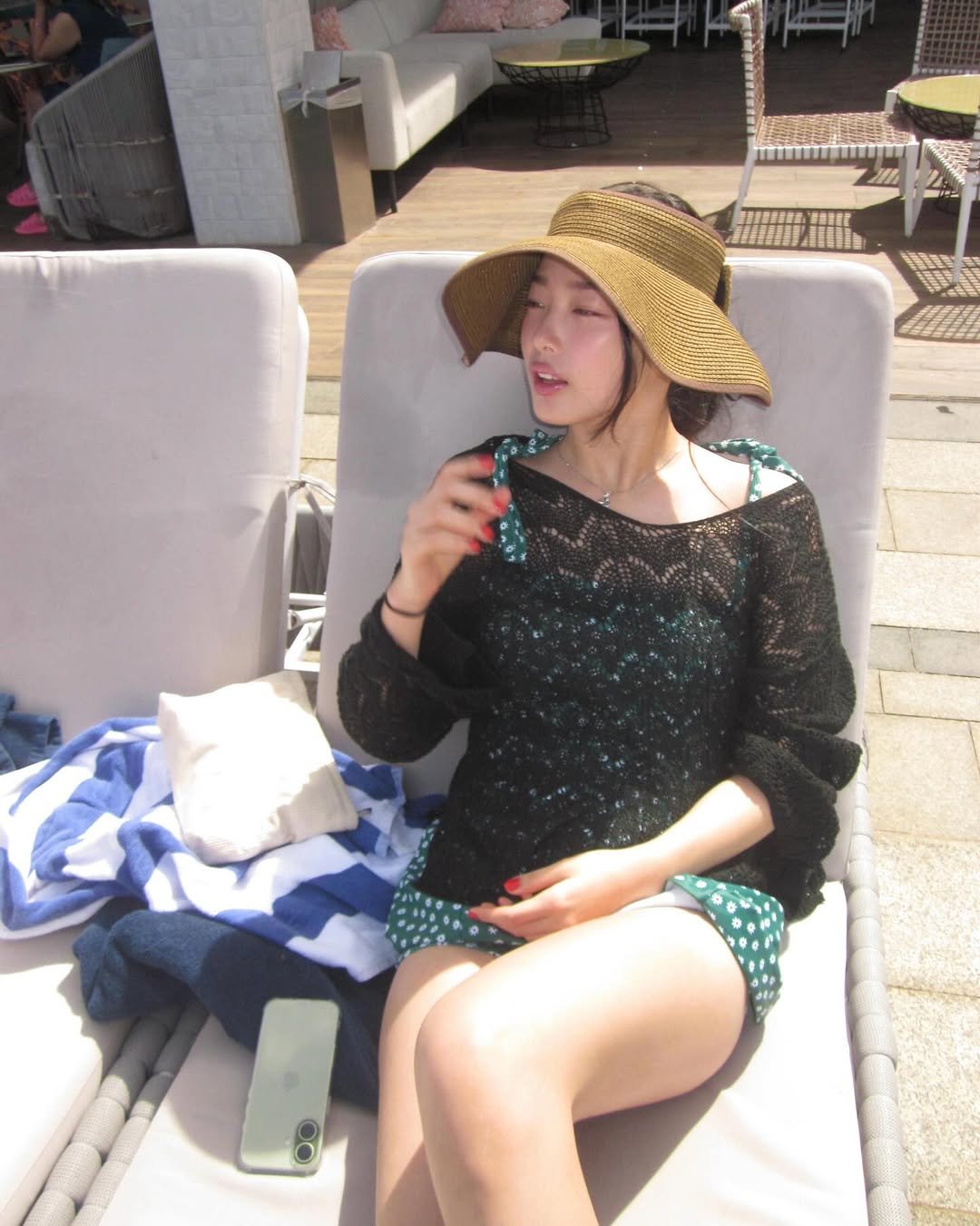 Photo by YOONCHAE JEUNG on January 08, 2026. May be an image of hat, cigarette, parasol, cigar, pool and text.