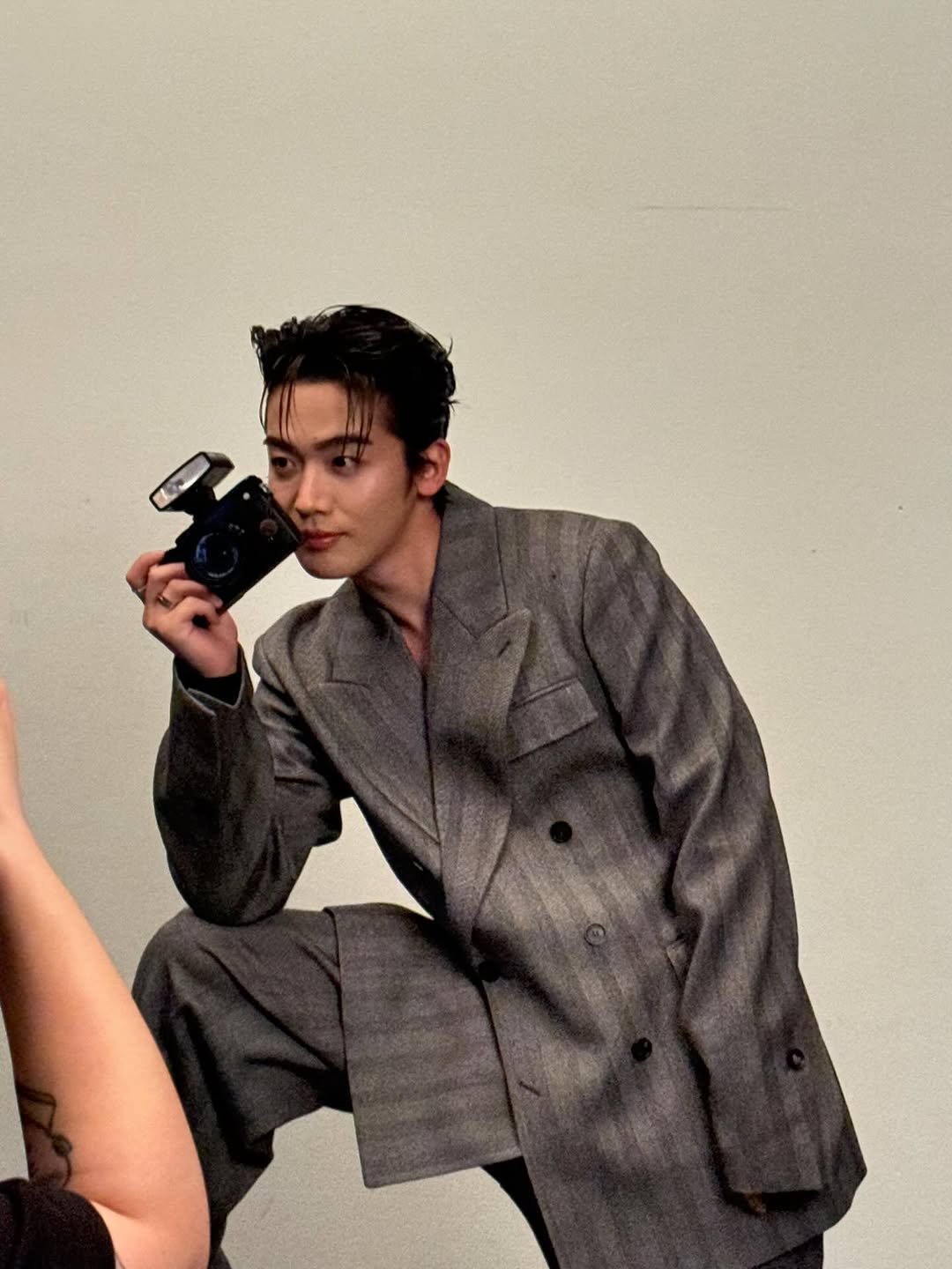 Photo by 김요한 on October 11, 2025. May be an image of one or more people, suit and text.