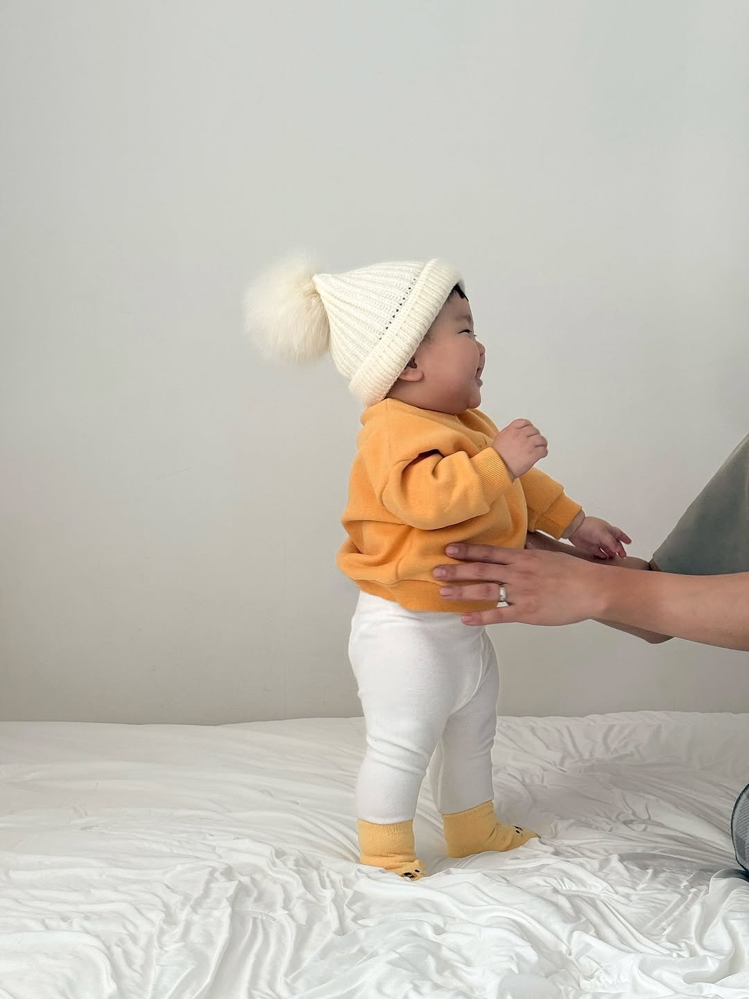 Photo shared by 윤샤샤 ◡̈ on November 03, 2025 tagging @machere_official. May be an image of baby, standing, knit, baby shoes and text.