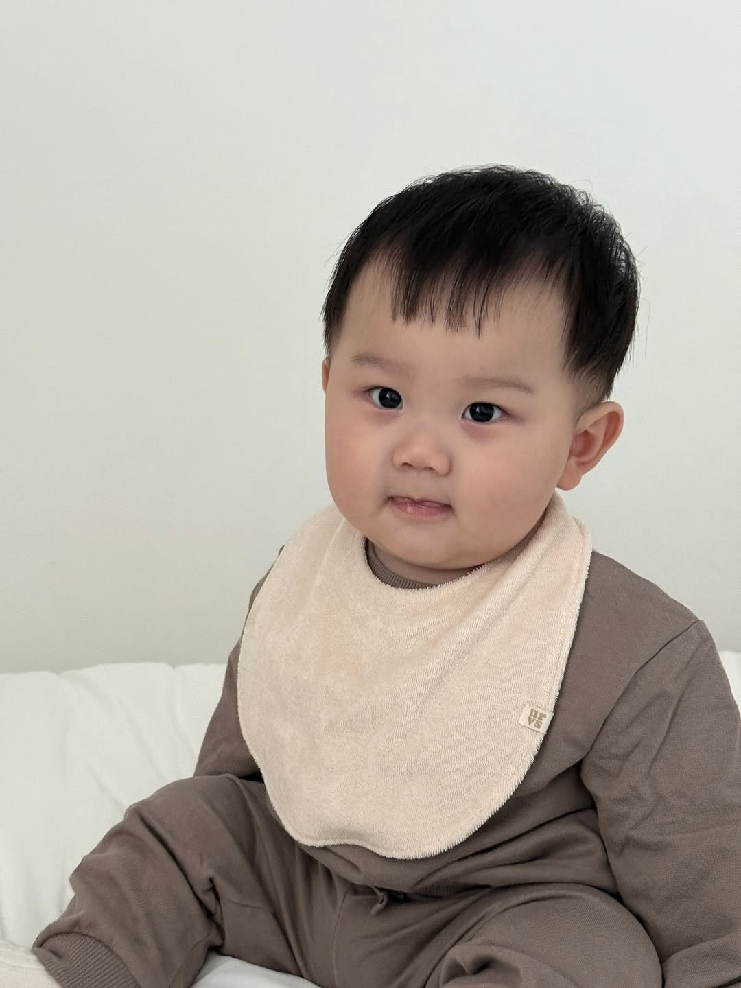 Photo shared by 윤샤샤 ◡̈ on September 22, 2025 tagging @you_are_very_special_. May be an image of 1 person, baby, turtleneck and text.