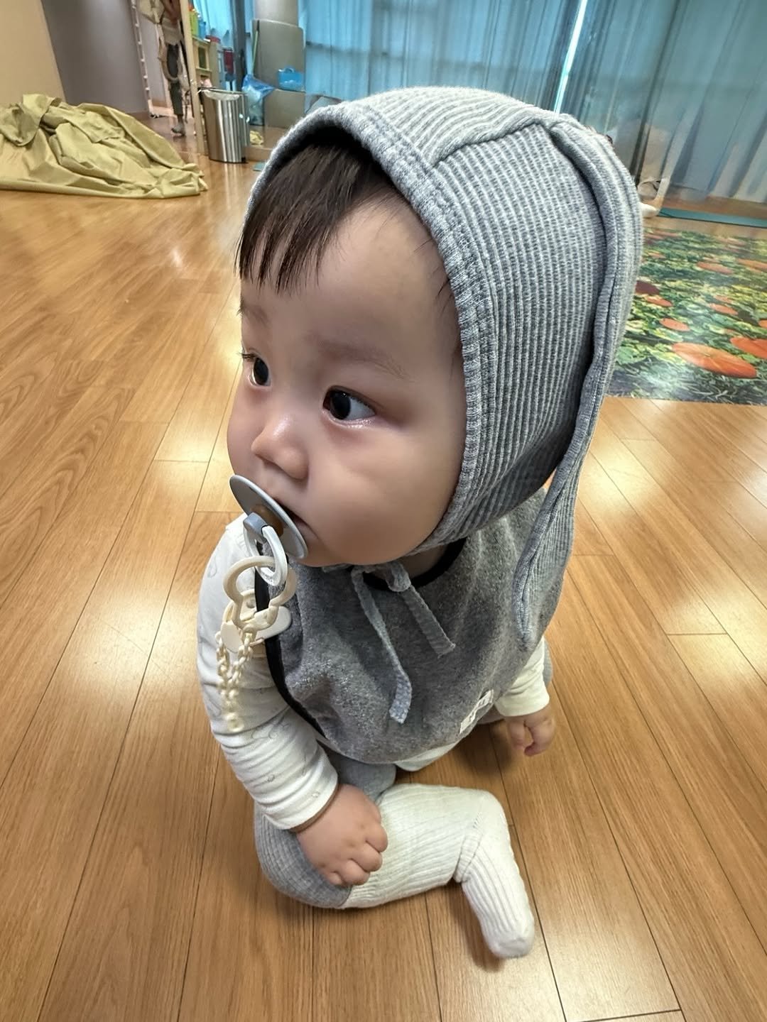 Photo by 윤샤샤 ◡̈ on October 01, 2025. May be an image of 1 person, baby, hat, diaper, knit and text.