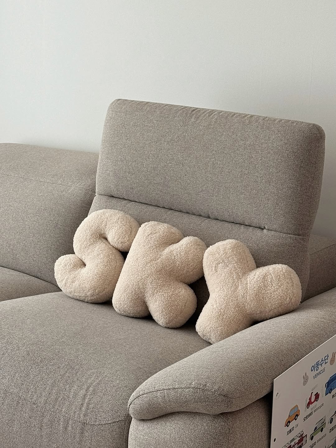 Photo shared by 윤샤샤 ◡̈ on November 06, 2025 tagging @monche_official. May be an image of toy, beanbag chair, armchair, sofa, chair, chaise lounge and text.