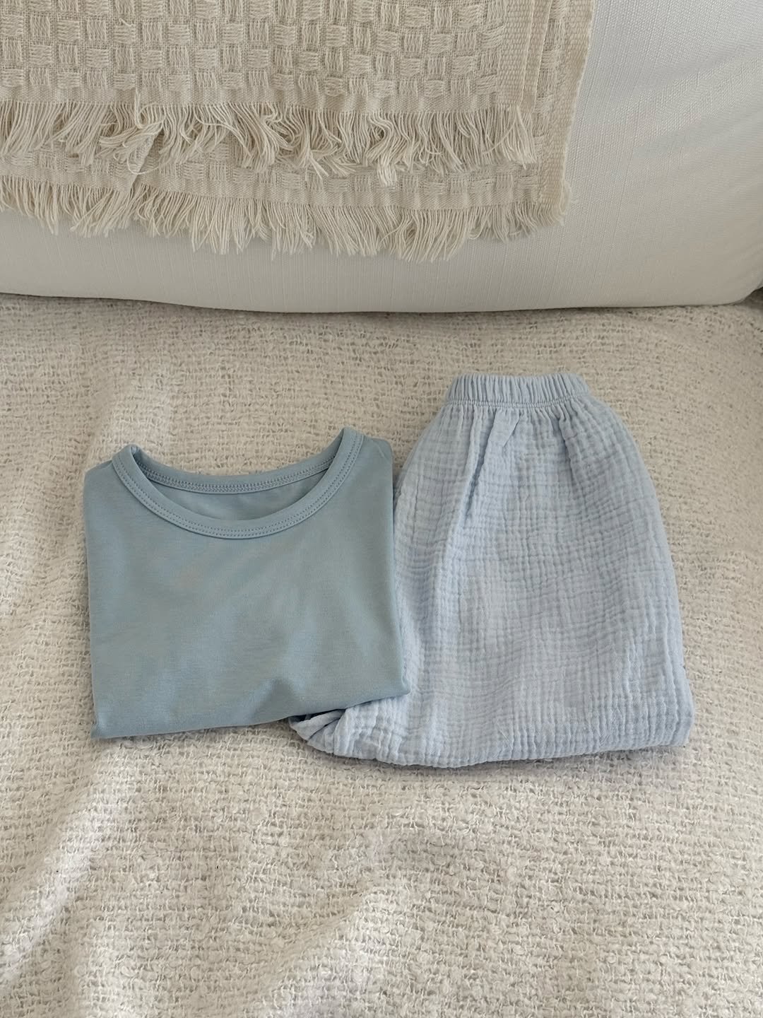 Photo shared by 윤샤샤 on April 15, 2026 tagging @1pro_official_. May be an image of sleepwear and text.