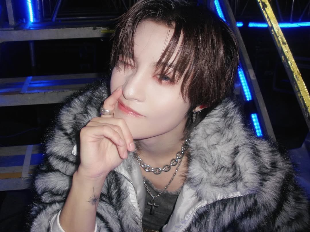 Photo by YangYang 양양 on February 14, 2026. May be an image of one or more people, bangs, bolo tie and text.