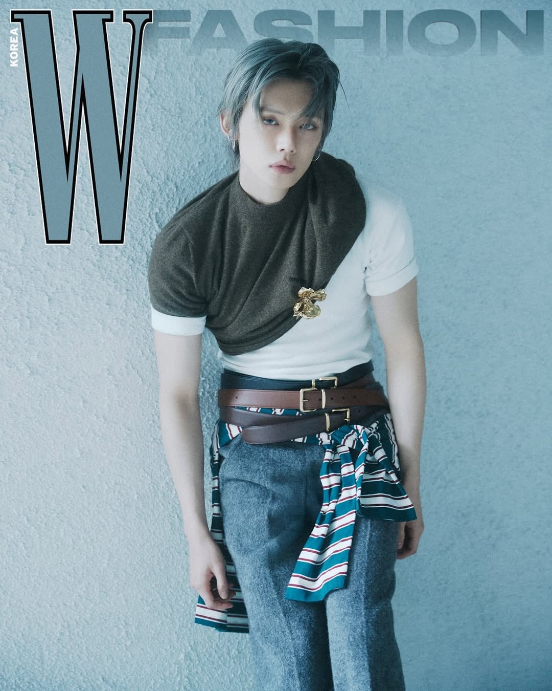 Photo shared by YEONJUN on September 01, 2025 tagging @wkorea, and @miumiu. May be an image of 1 person, bolo tie, belt, magazine, belt buckle and text.