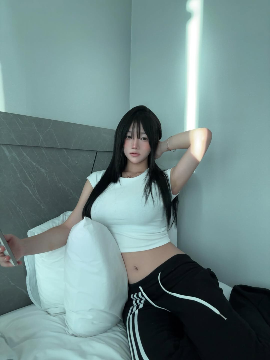 Photo by 이예은 on January 02, 2026. May be an image of one or more people, hair, sweatpants and bed.