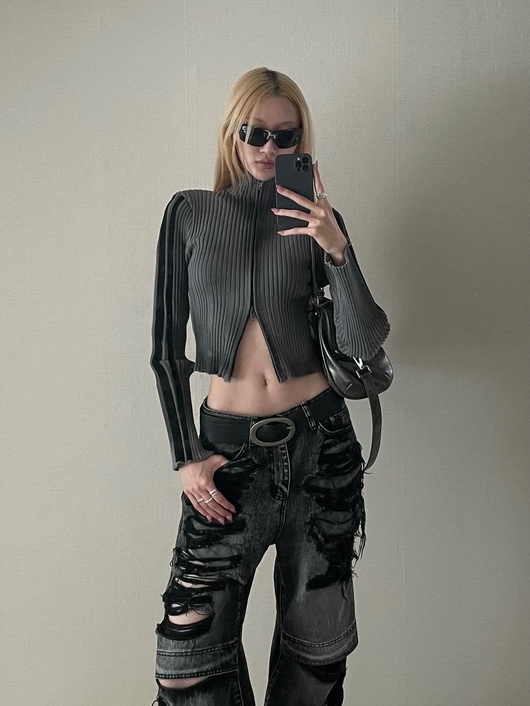 Photo by Yein on September 24, 2025. May be an image of 1 person, leather, costume, glasses and text.