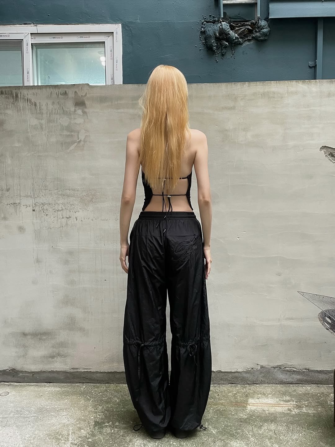Photo by Yein on September 17, 2025. May be an image of 1 person, blonde hair, fishnet stockings, jumpsuit and text.