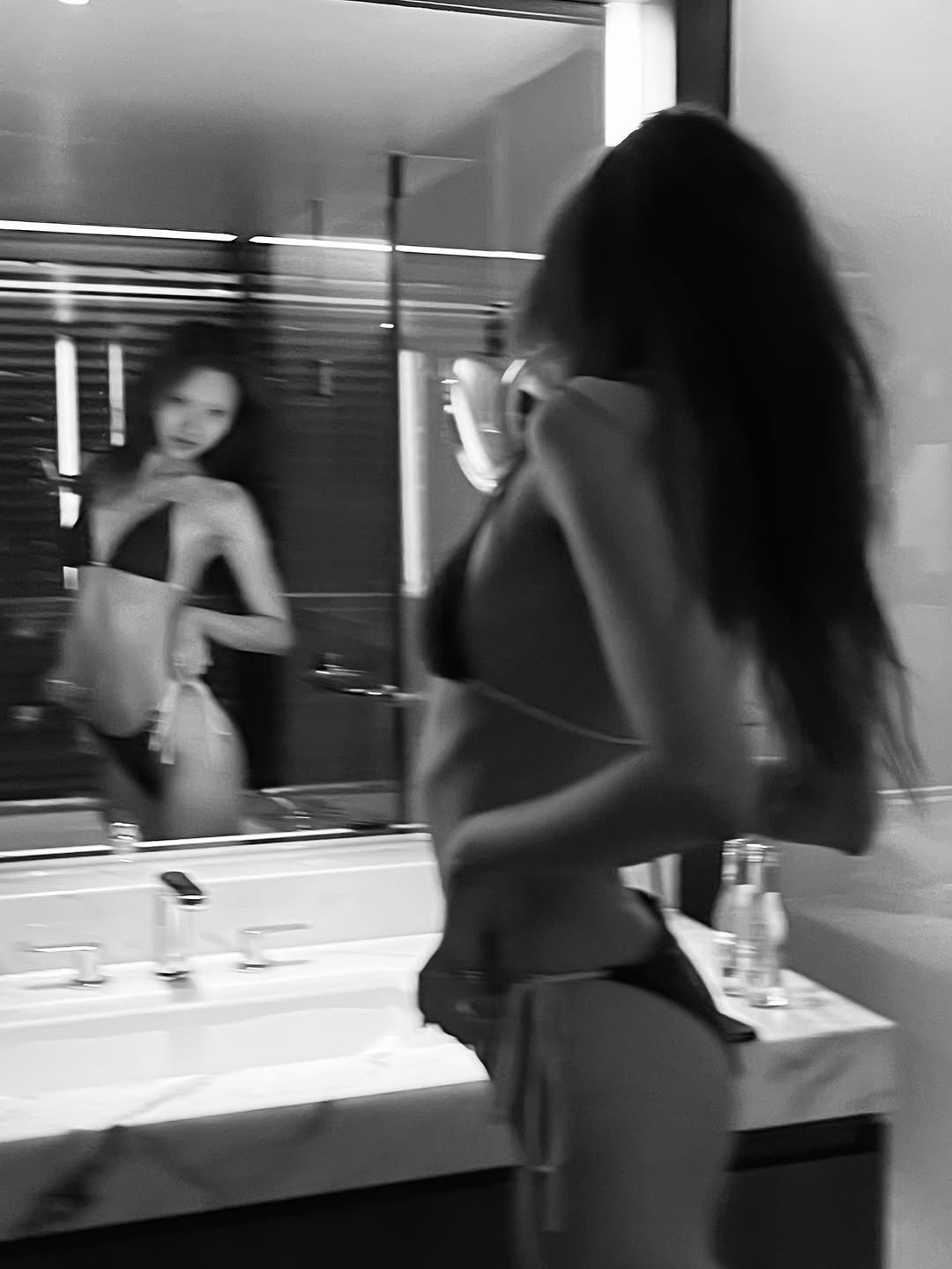 Photo by Yein on July 23, 2025. May be a black-and-white image of 2 people, underwear, mirror and text.