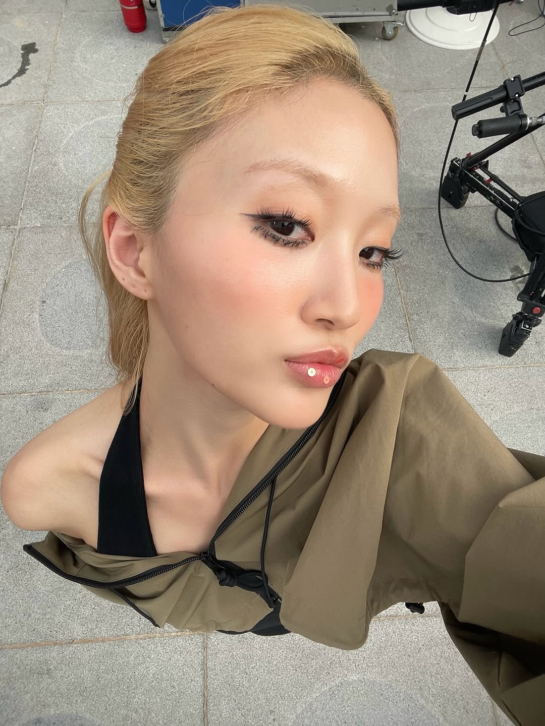 Photo by Yein on September 25, 2025. May be an image of 1 person, blonde hair, braids, makeup and text.