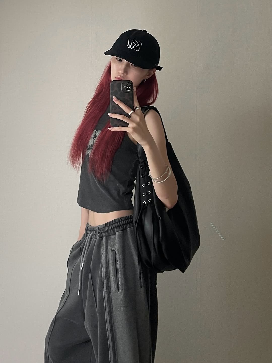 Photo by Yein on July 28, 2025. May be an image of 1 person, hat, drawstring, sweatpants and text.
