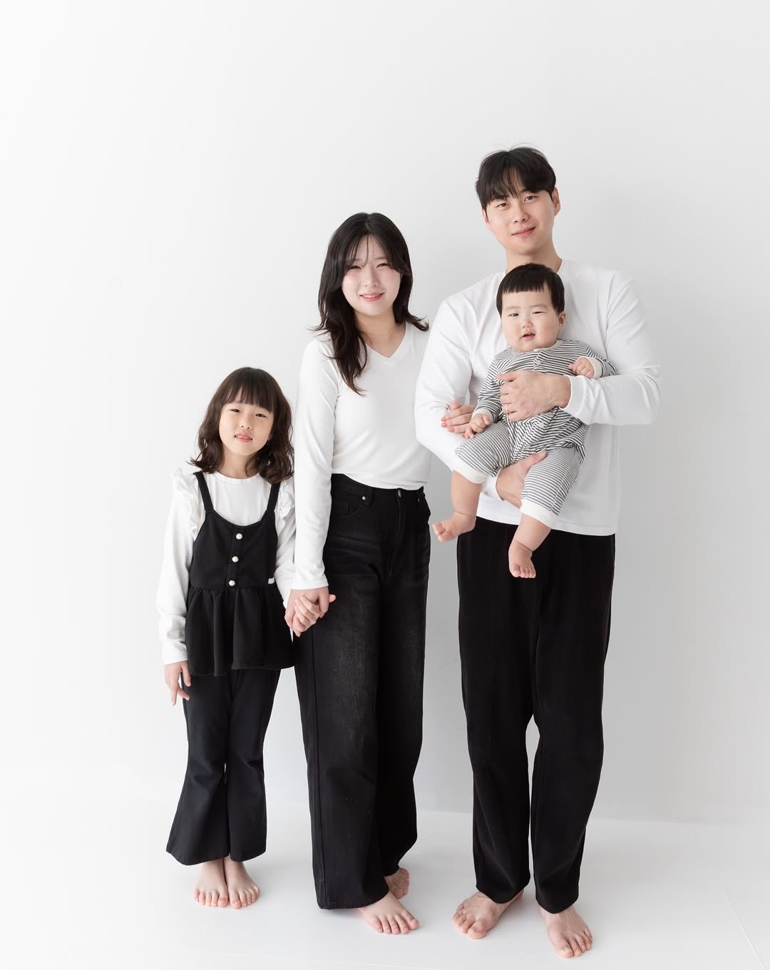 Photo by 김예빈(예블리즈) on December 31, 2025. May be an image of baby, sleepwear, jumpsuit and text.