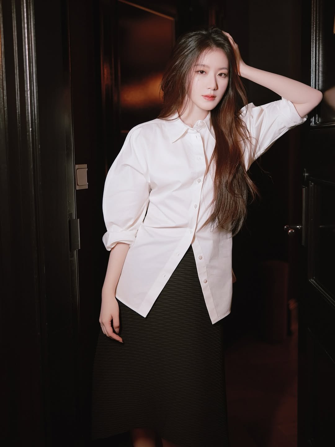 Photo by Shuhua on September 15, 2025. May be an image of 1 person, hair, coat, top, dress, blazer and text.