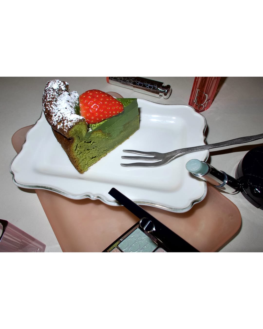 Photo shared by 예지 Yeji 🐿️ KIM on December 17, 2025 tagging @diorbeauty. May be an image of strawberry, chiffon cake, fork and text.