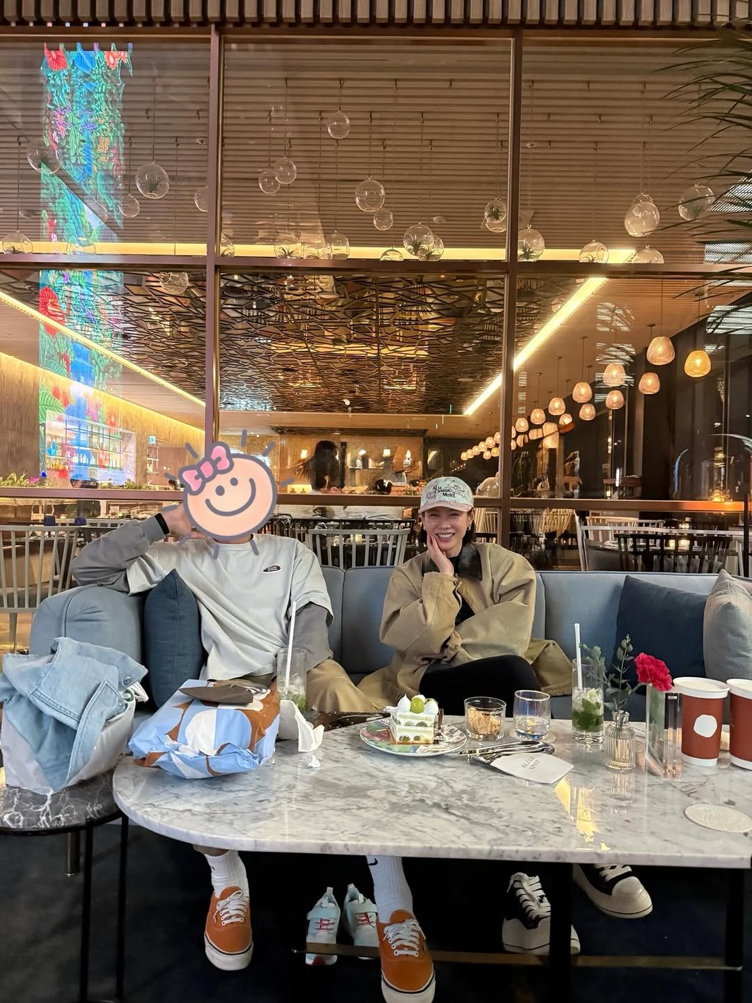 Photo by 손예진 on April 19, 2026. May be an image of duffle coat, display case, cornflower and text.