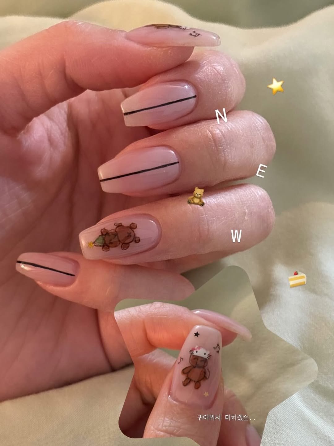 Photo by Yelli on April 14, 2026. May be an image of one or more people, fingernails, gingerbread cookie and text that says 'N E W W 귀여워서미치겠슨. 귀여워서 미치겠슨.'.