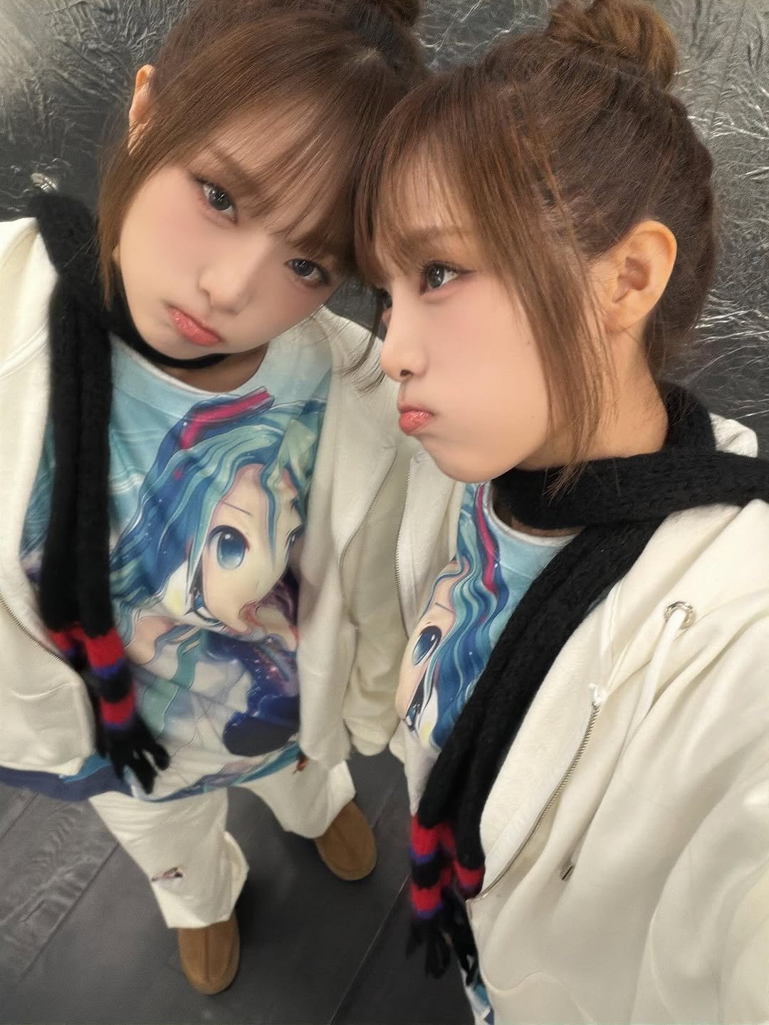 Photo by 최예나 on November 30, 2025. May be a selfie of one or more people, hair, duffle coat, bath robe, parka and text.