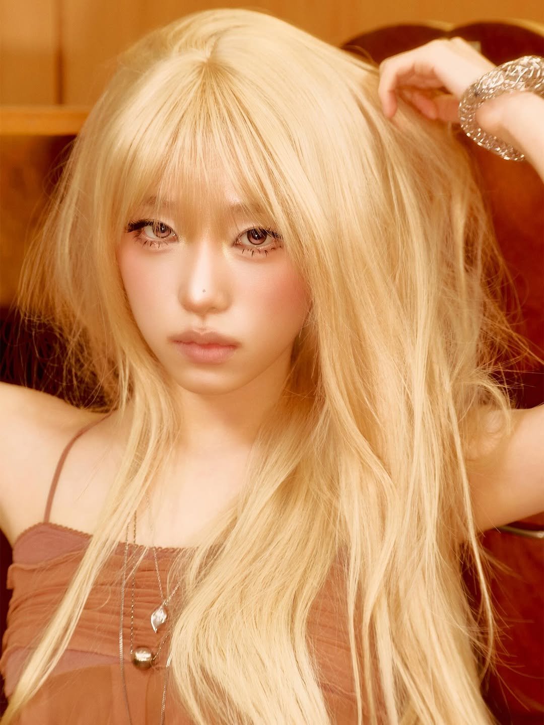 Photo shared by @_yenacore on February 23, 2026 tagging @yena.jigumina. May be an image of one or more people, bangs, braids, blonde hair, makeup, headdress and text.