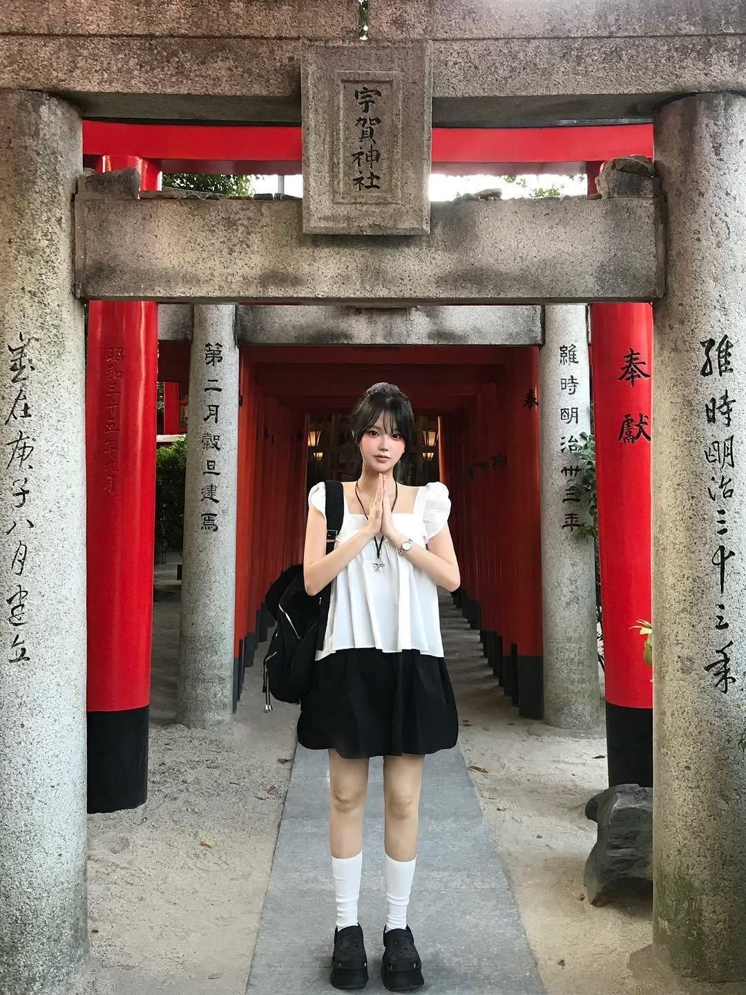 Photo by 연 on September 13, 2025. May be an image of 1 person, Fushimi Inari Taisha and text.