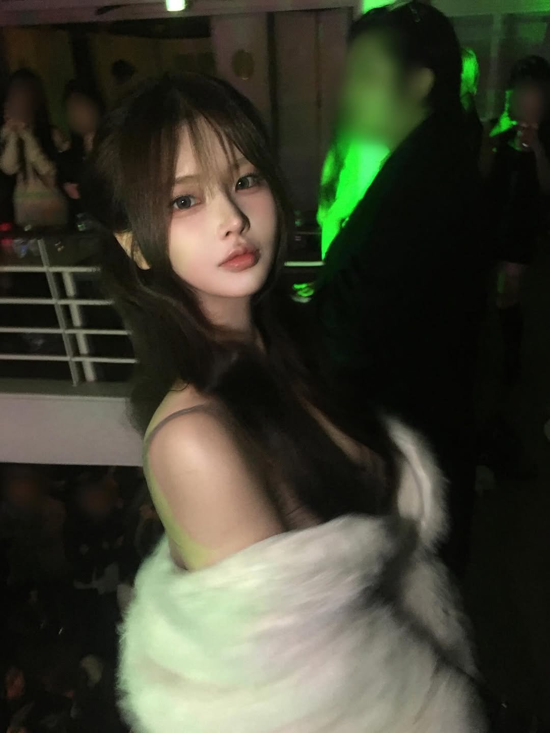 Photo shared by 연 on February 14, 2026 tagging @101breaktime. May be an image of one or more people, hair, parka, top, night and text.