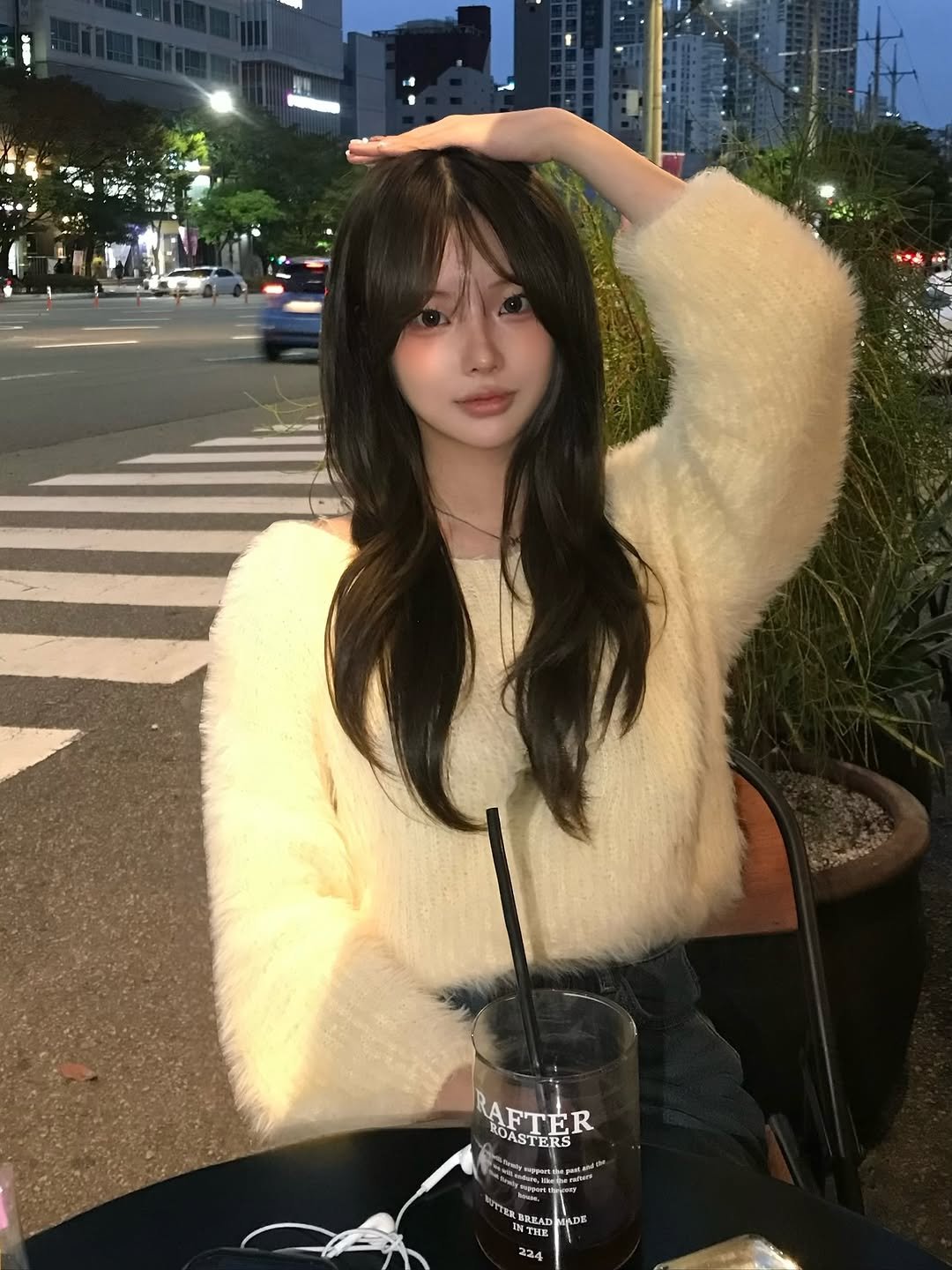 Photo shared by 연 on October 22, 2025 tagging @happynian_dream. May be an image of one or more people, hair, duffle coat, parka, cornflower, night and text.