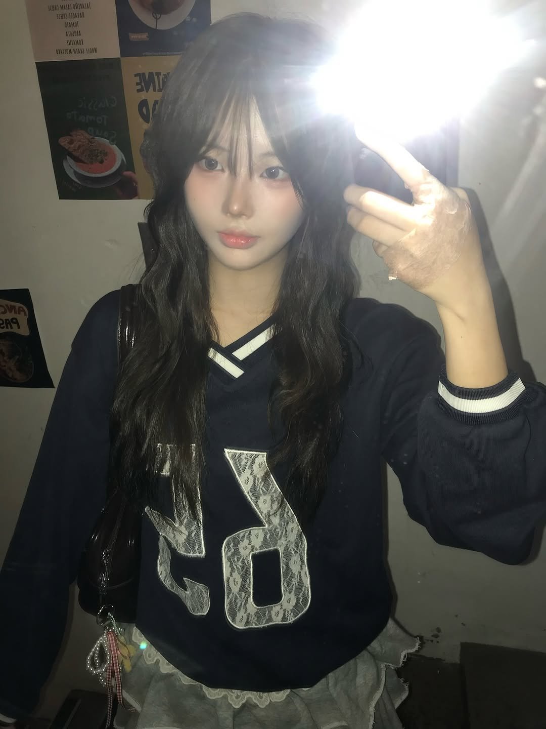 Photo shared by 연 on October 16, 2025 tagging @youhee.official. May be a selfie of one or more people, hair, miniskirt, sweatshirt, top and text.