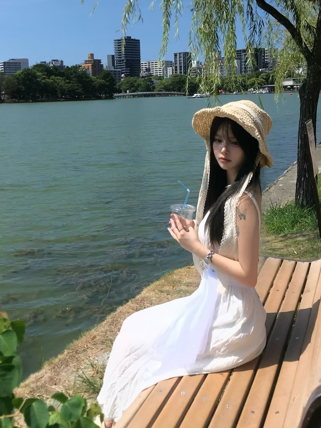 Photo by 연 on September 17, 2025. May be an image of 1 person, lake and text.