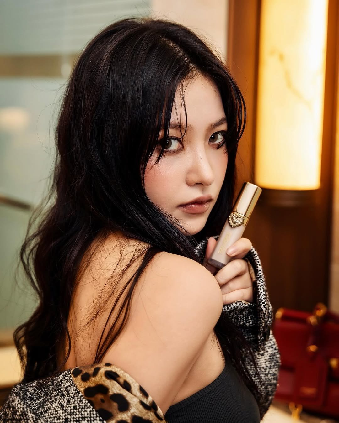 Photo shared by 김예림 🪽 yeri on December 23, 2025 tagging @dolcegabbana_beauty. May be an image of one or more people, hair, makeup, cigarette and text.