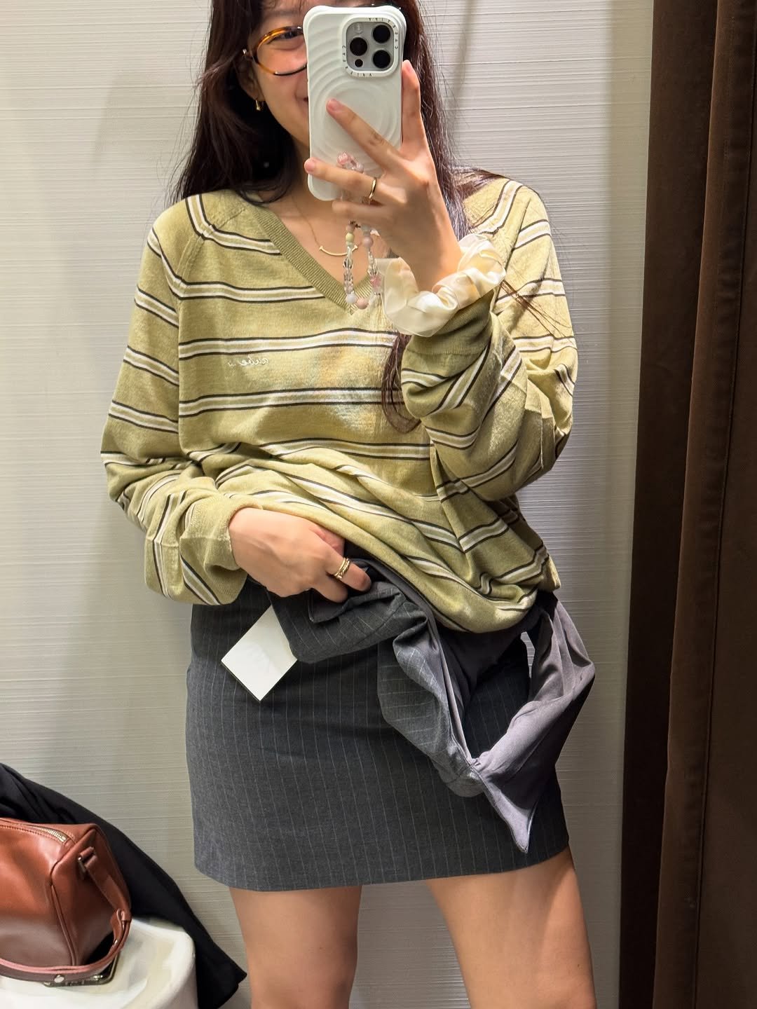 Photo by 장유선 on September 28, 2025. May be an image of 1 person, skirt, shorts, miniskirt and text.