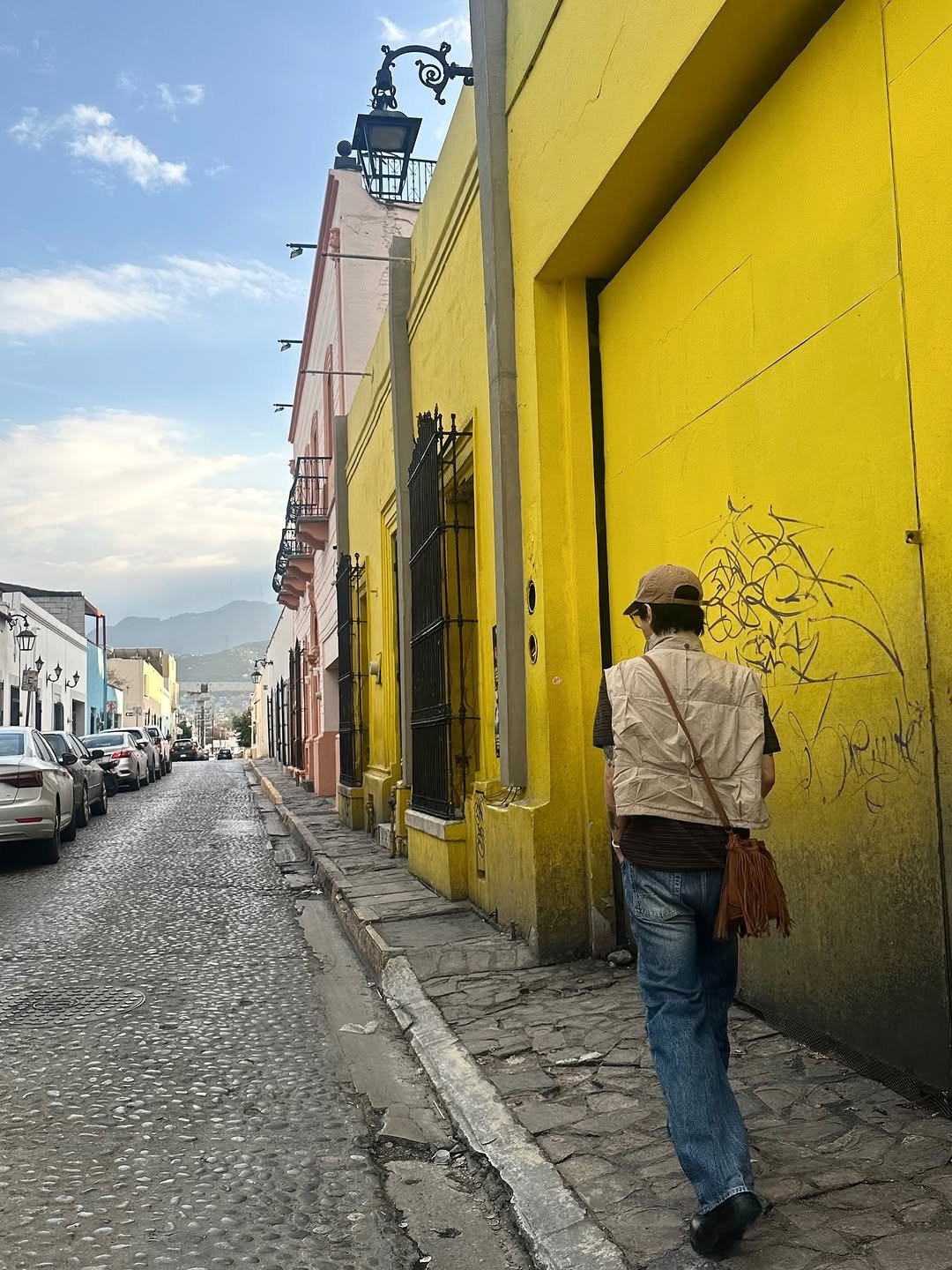 Photo shared by Yesung on October 13, 2025 tagging @yesung_smtown. May be an image of one or more people, street and text.