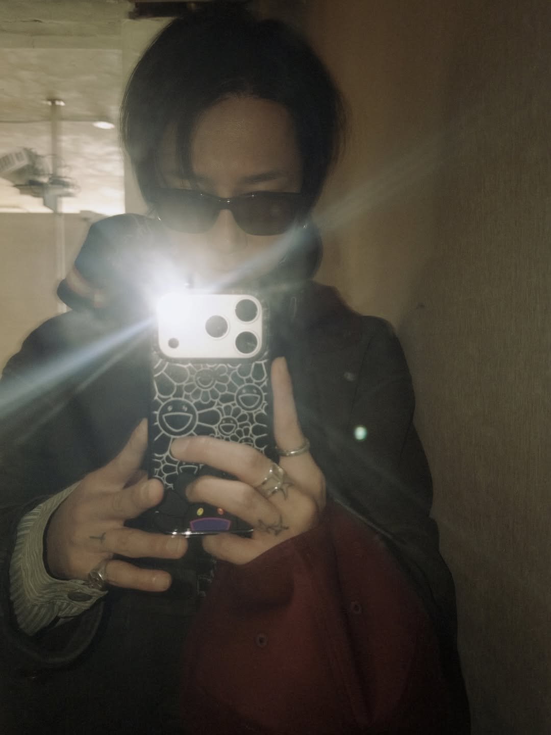 Photo shared by Yesung on February 25, 2026 tagging @yesung_smtown. May be a selfie of phone, duffle coat, overcoat, jacket, mirror, parka and text.