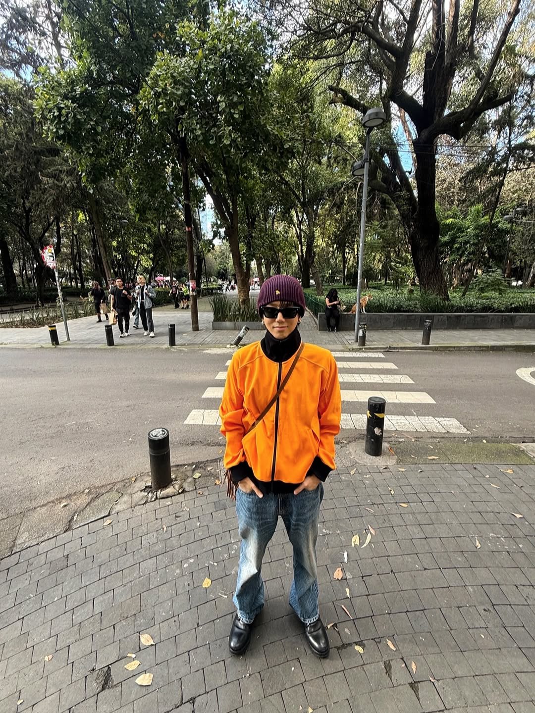 Photo by Yesung on October 11, 2025. May be an image of jacket, parka, street and text.