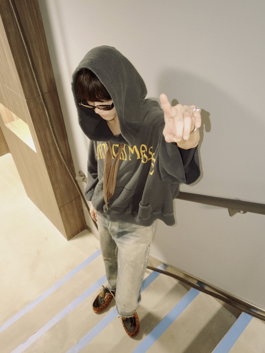 Photo shared by Yesung on November 16, 2025 tagging @yesung_smtown. May be an image of one or more people, bangs, duffle coat, sweatpants and text.