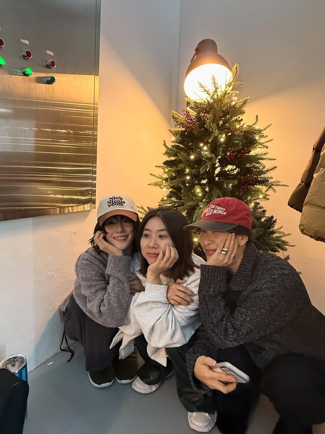 Photo by SEO YEA JI on December 19, 2025. May be an image of one or more people, christmas tree, hat, cornflower and text.