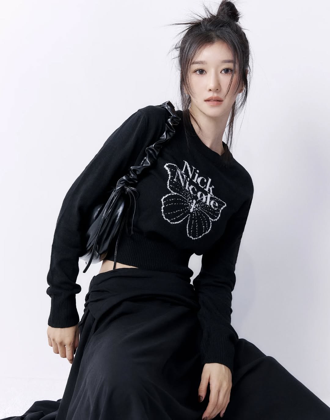 Photo by SEO YEA JI on November 20, 2025. May be an image of one or more people, hair, top, turtleneck, dress and text.